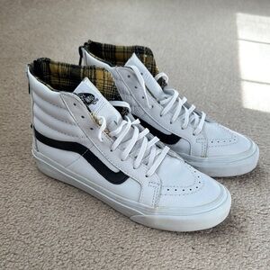 Vans women’s size 5 White and Black High-Top Sneakers
